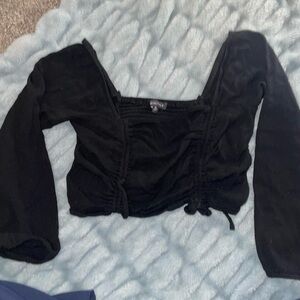 Black long sleeve crop top from Kendall and Kylie